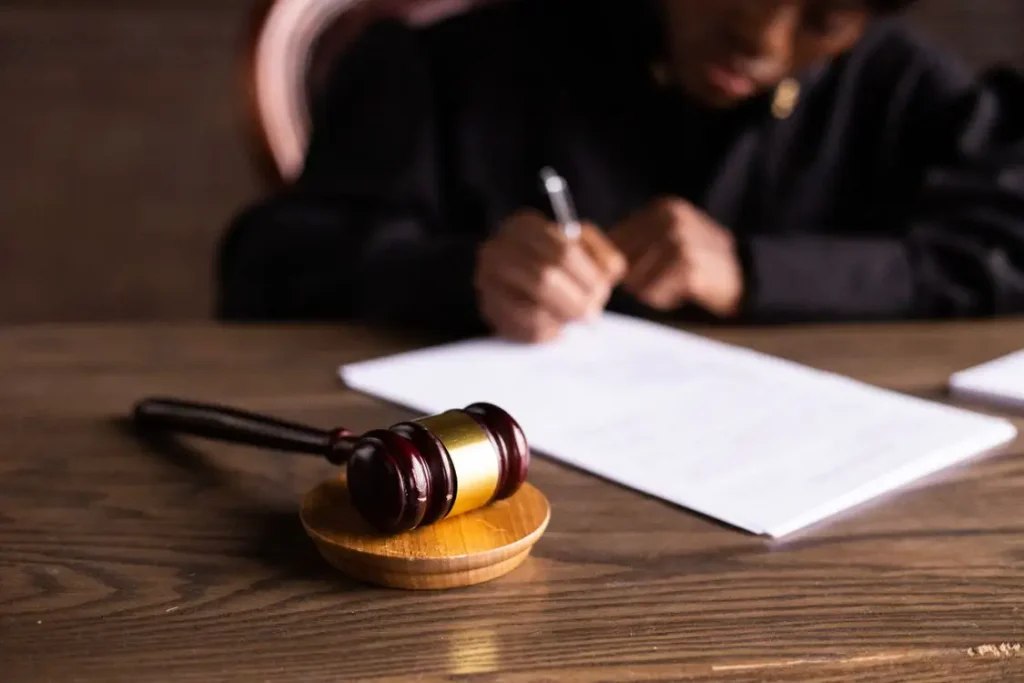 Judge's gavel on wooden desk